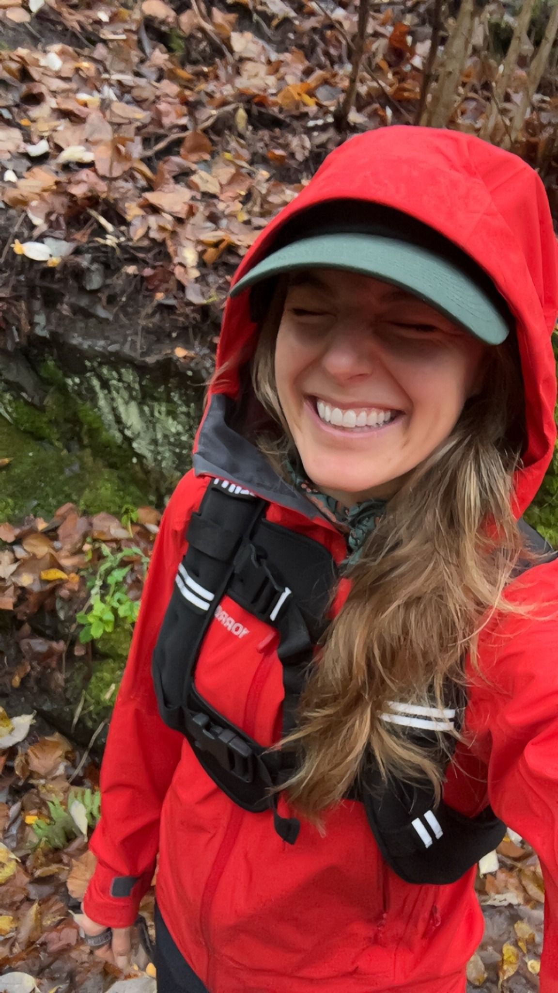 Savannah enjoying an autumn walk in a red jacket
