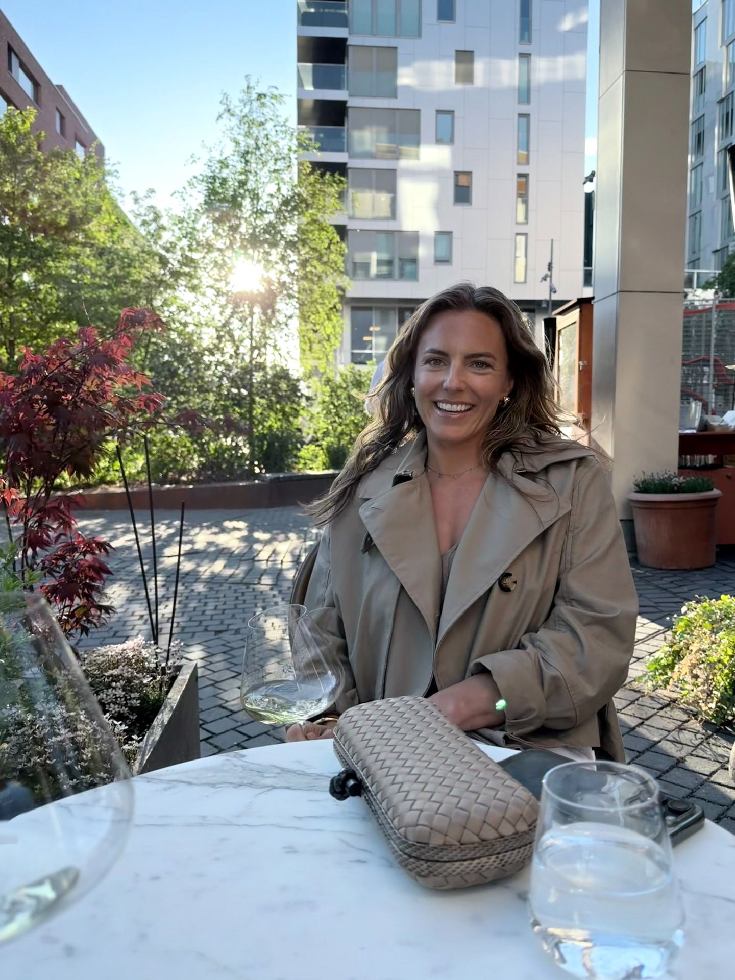 Savannah smiling at an outdoor café