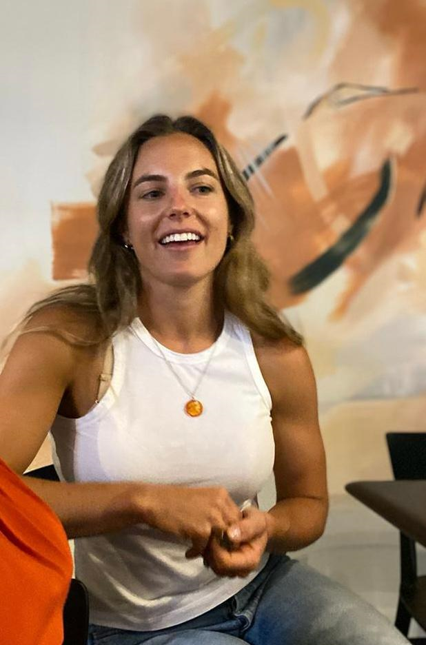 Savannah smiling during a conversation